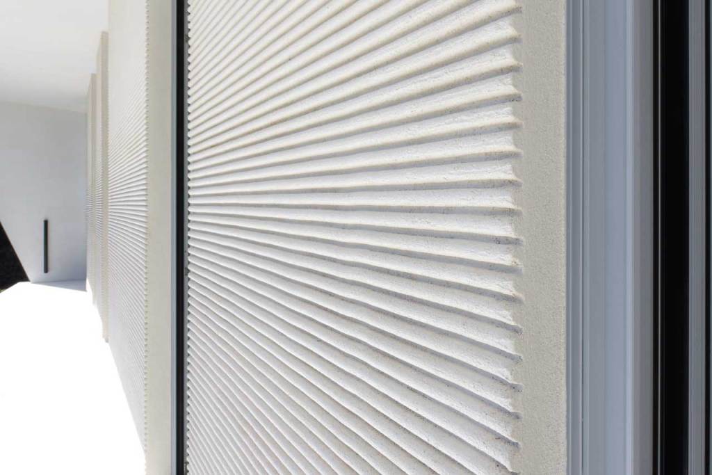 Involucro ad alte prestazioni e finitura materica: il progetto di una residenza a Catania DSC 3968